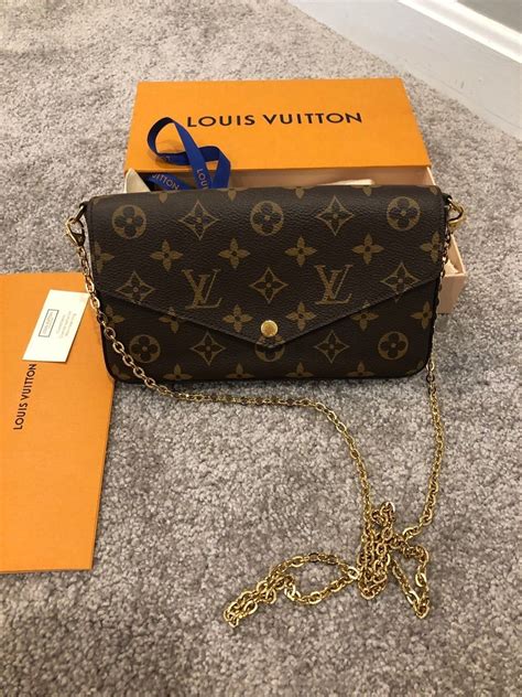 louis vuitton black bag gold chain|louis vuitton pochette gold chain.